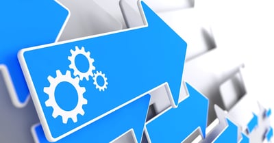 Cogwheel Gear Mechanism Icon on Blue Arrow on a Grey Background. Cogwheel Gear Mechanism Icon on Blue Arrow on a Grey Background.